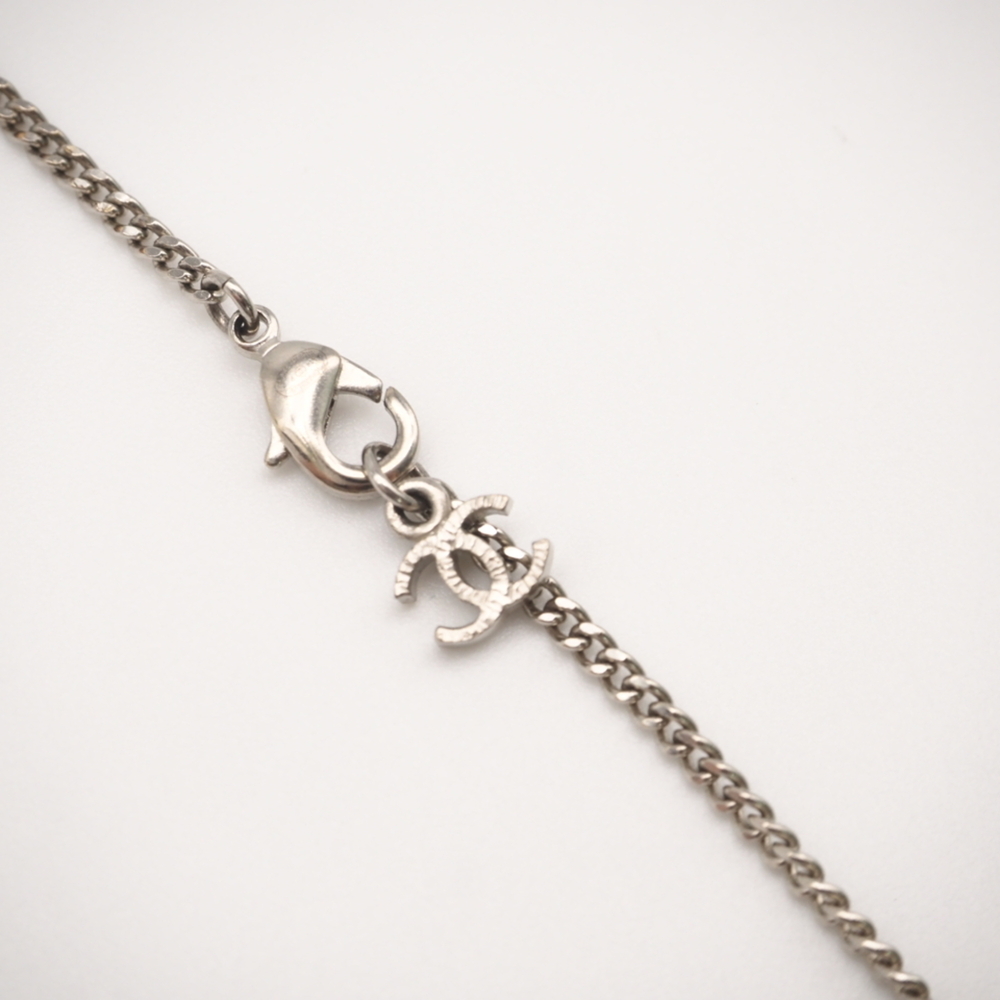 CHANEL Authentic Silver Logo Necklace - Picture 10 of 13